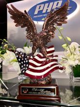 MD Helicopters Presents Award to Precision Aviation Group